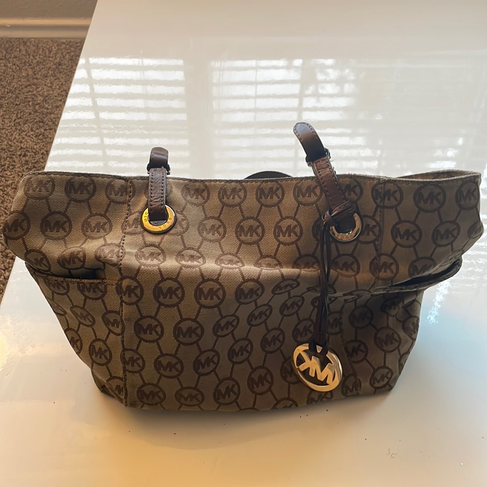 COPY - Tan and brown Michael Kors bag.